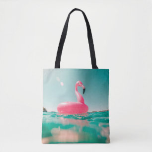 Rosa flamingo simma ring på vatten i somras tygkasse