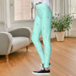 Rosa flamingos mynta grönt leggings<br><div class="desc">Mint grönt-bakgrund som har dekorerats med ett flamingomönster för rosa.</div>