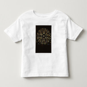 Rosa fönster ovanför den västra dörren, med de t-shirt