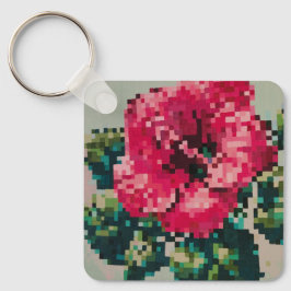 Rosa hibiskusblomma i pixelart nyckelring