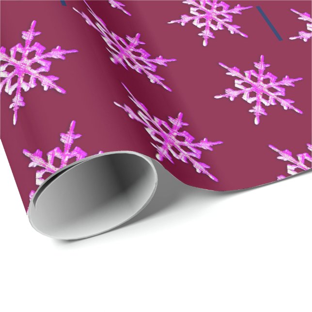 Rosa iridescent snowflake på burgundi presentpapper (Rullad Hörn)