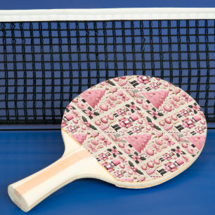 Rosa julgran med nötknäppare pingisracket
