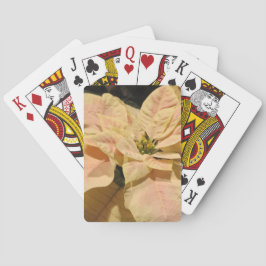 Rosa julstjärnajul som leker kort spelkort