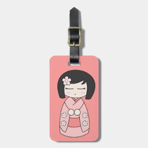 Rosa Kokeshi bagagemärkre Bagagebricka