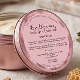 Rosa kosmetikburksetikett med ingredienser runt klistermärke