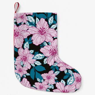 rosa lila bläckblomma blå löv svart bakgrund liten julstrumpa