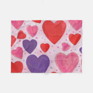 Rosa lilor och röda valentin daghjärtor fleecefilt