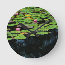 rosa lotus black rund klocka