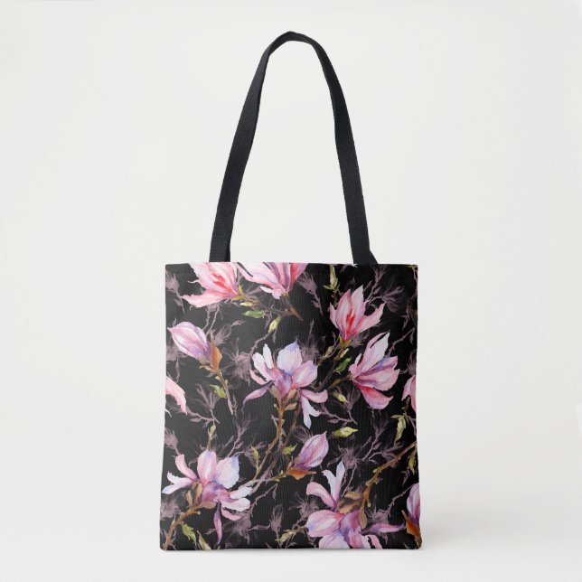 Rosa magnolia-blommor på en mönster tygkasse (Framsida)