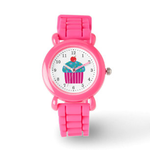 Rosa muffin med turkos som glaserar det röda armbandsur