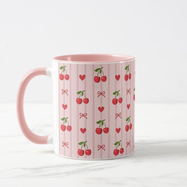 Rosa mugg med röda körsbär och röda slingor och hj (Vänster)