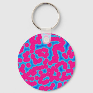 rosa- och blåskärande polkadoter nyckelring