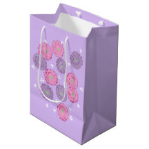 Rosa och lila blommor på lavendelpresentförpacknin