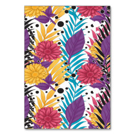 Rosa och lila snittblommor med krångliga blad bordsnummer