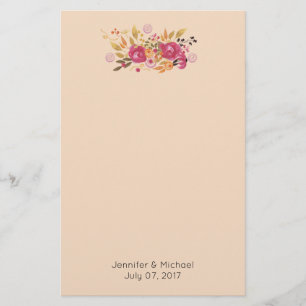 Rosa och orange blomsterbukett på persikofärgad ba brevpapper