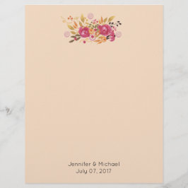 Rosa och Orange Flower Bouquet på persikobakgrunde