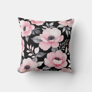 rosa och svart blommigt kudde