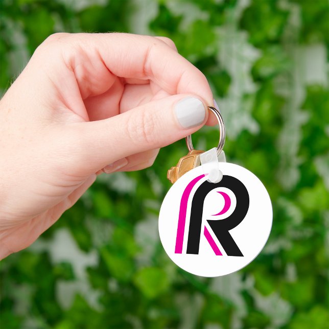 ROSA OCH SVART BREV R NYCKELRING (Skapare uppladdad)