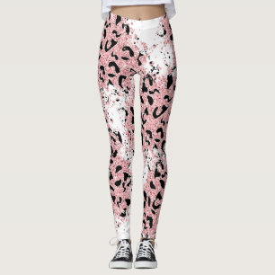 Rosa och svart djurutskrift på vitt leggings