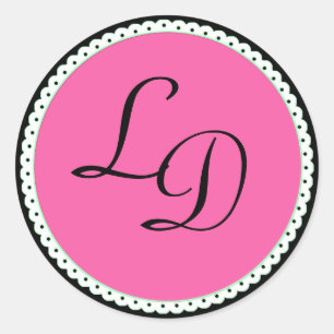 Rosa och svarta monogram-stiftssymboler runt klistermärke