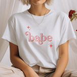 ROSA ORANGE Disco Babe Brudens sida hen DO Shirt T Shirt<br><div class="desc">Gå tillbaka i tiden med vår Retro Disco Boll Inbjudningskort för möhippa & Decor-samling. Lägg dig i nostalgien på 70-talet med muterade beige och grått-bågar, förstärkta av groovy silver glitter typsnitt. Den ikoniska retrodisco boll är i centrum och framkallar en era av dikoglamor, samtidigt som man håller en aning kvinnlig...</div>