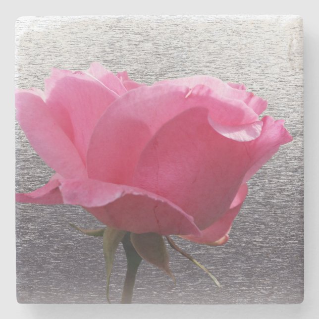 rosa över grå stenunderlägg (Framsidan)
