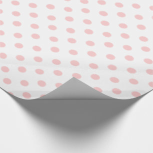 Rosa polka dots för baby på vit presentpapper