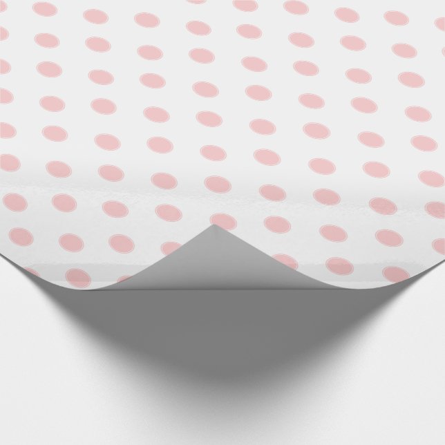 Rosa polka dots för baby på vit presentpapper (Hörn)