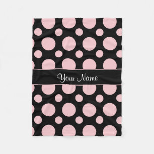 Rosa polka dots på svart bakgrund fleecefilt