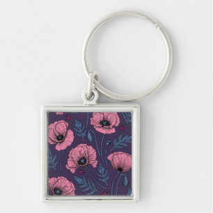 Rosa poppies på mörk violett fyrkantig silverfärgad nyckelring