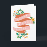 Rosa Ribbon & Flowers Grattis på födelsedagen Gran Kort<br><div class="desc">Blommigt födelsedagskort för mormor med "grattis på födelsedagen morma" skrivet i vitt på ett rosa band som är dekorerat med gula blommor och grönt.</div>