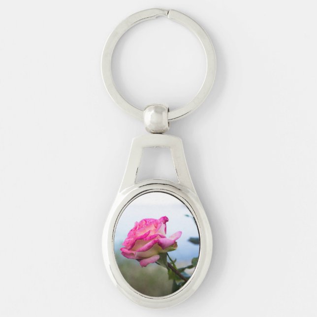 Rosa ro ovalt silverfärgad nyckelring (Framsidan)