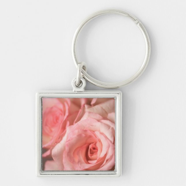 Rosa ros fyrkantig silverfärgad nyckelring (Framsidan)