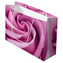 Rosa ros kronblad vikta till perfektion