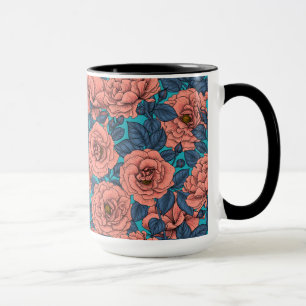 Rosa ros med blå löv på blå mugg