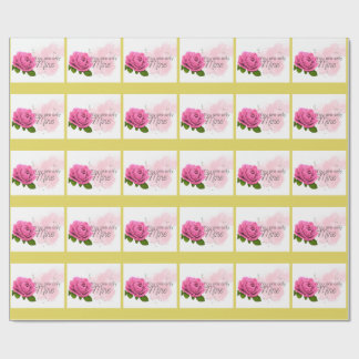 Rosa ros med text presentpapper