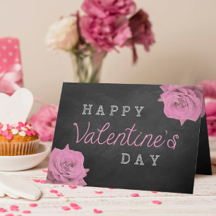 Rosa ros på lyckliga valentin för svart tavla dag helgkort