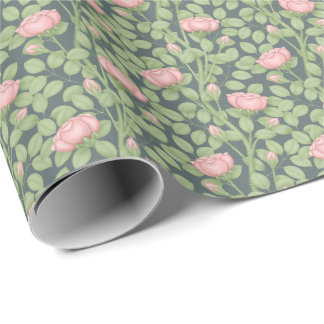 Rosa ros på skifferblått presentpapper