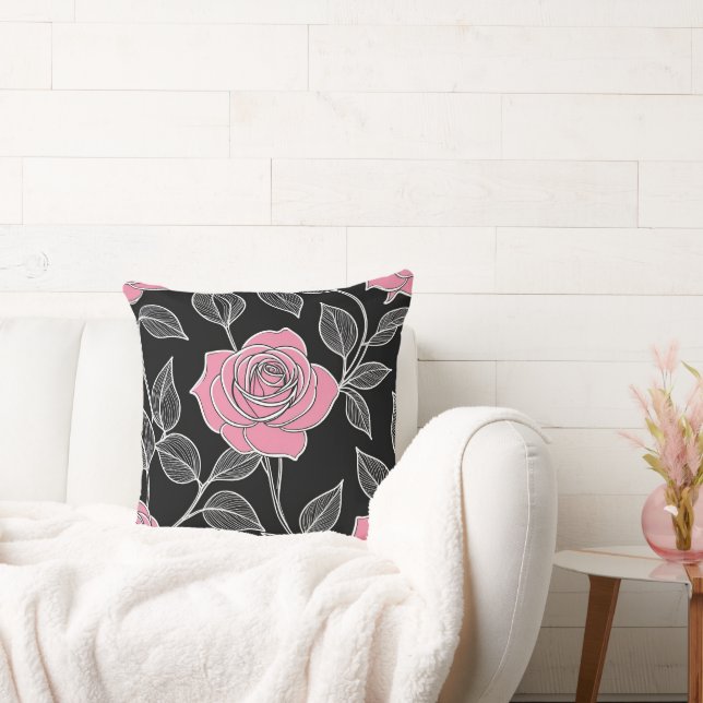 Rosa ros på svart kudde (Soffa)