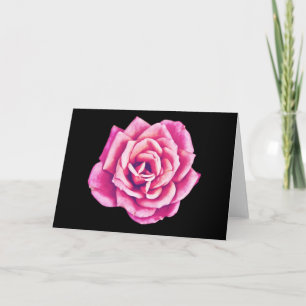 Rosa ros på svarta anteckningskort