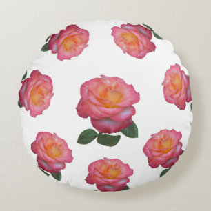 Rosa rosblommor på vitt rund kudde