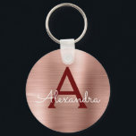 Rosa roséguld burgunder Rostfritt stål Monogram Nyckelring<br><div class="desc">Rosablom - Roséguld och burgunder imitation rostfritt stål Metallisk Elegant Nyckelring. Dessa nyckelringar kan anpassas till att inkludera din initial och förnamn. Dessa nyckelringar är perfekta som födelsedagspresent,  bröllopsdusch eller möhippa present.</div>