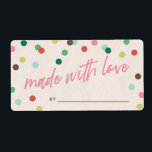 Rosa Sprinkles som gjorts med Kärlek-partiets favo Fraktsedel<br><div class="desc">Denna lekplatsetikett skapades för att koordineras med julfesten "Decorate Celebrate". Den innehåller frasen "tillverkad med kärlek" i handskrivet skript med text över en beige bakgrund och omgiven av ett gäng färgfyllda pricksprinkler. Utformningen skapades för märkning av julkaka som dekorerar party favors, men det skulle också vara perfekt för märkning av...</div>