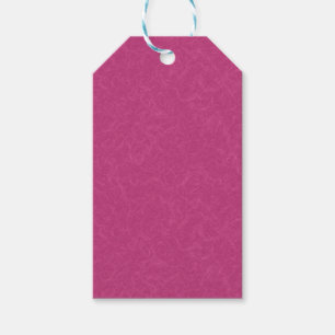 Rosa texturerad yta med virvlande mönster presentetikett