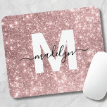 Rose Gold Blush Pink Glitter Name Monogram Musmatta<br><div class="desc">Personalized Blush Pink Glitter Initial Monogram Mouse Pad. Add a touch of glam and elegance to your workspace with this stylish mouse pad. Featuring a faux rose gold blush pink glitter background, a crisp white initial letter, and a sleek black script name, this design is perfect for anyone who loves...</div>