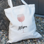 Rosé Vin Bridesmaid Bröllop Brudens sida Tygkasse<br><div class="desc">Rosé hela dagen i väskan,  med en vattenfärgsmålning av ett stort glas vin. Anpassa till namn i brudens sida för en roligt  från bröllop.</div>