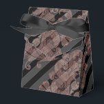 Roséguld och svart presentaskar<br><div class="desc">Elegant presentask med roséguld damaskus och svarta randiga mönster.</div>