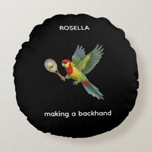 Rosella-papegoja som spelar tennis rund kudde