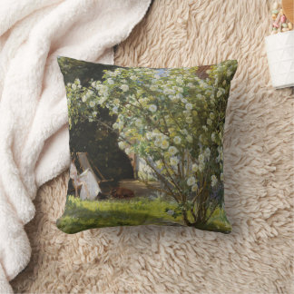 Roses. Marie Krøyer seated in the deckchair Kudde