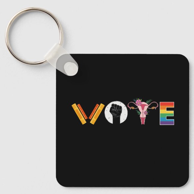 RÖSTA Böcker Livmoder HBTQ Stöd Nyckelring (Framsida)
